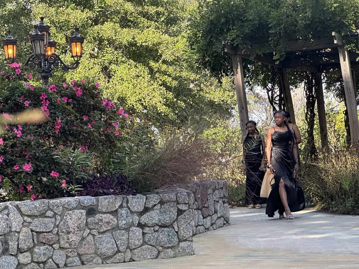 Bridesmaids walking through the gardens at Mariani's Venue near Florence, SC